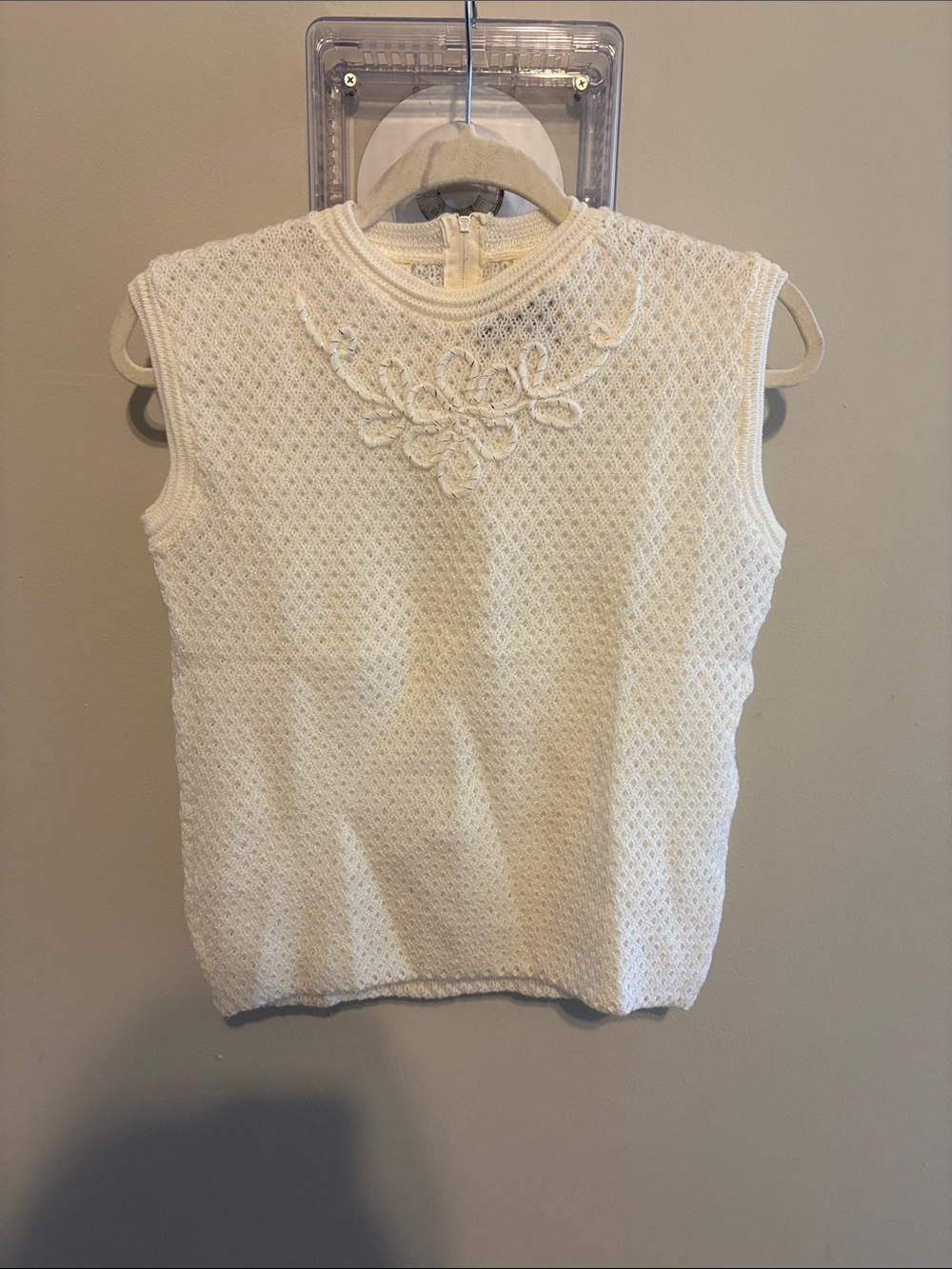 Sleeveless Cream Knit Top with Floral Applique